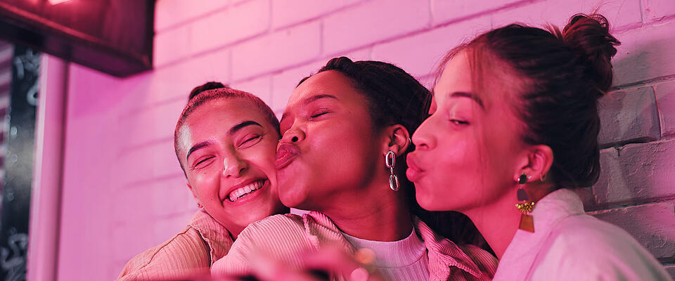 Happy woman, friends and night with selfie for photography, picture or outdoor memory on wall. Female person or young group of girls enjoying late party with smile for moment or social get together